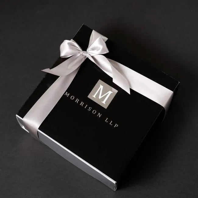 A Gray Jay gift finished with branded packaging and a satin ribbon