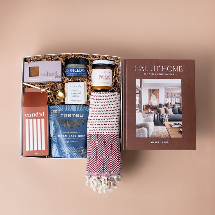 Call It Home gift box with Amber Lewis's book, Candid coffee, JusTea, honey, Salted caramels and a woven towel.