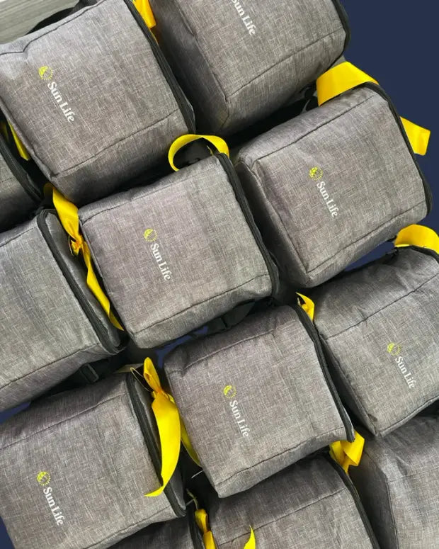 Sun Life Financial reusable cooler bags with yellow ribbons