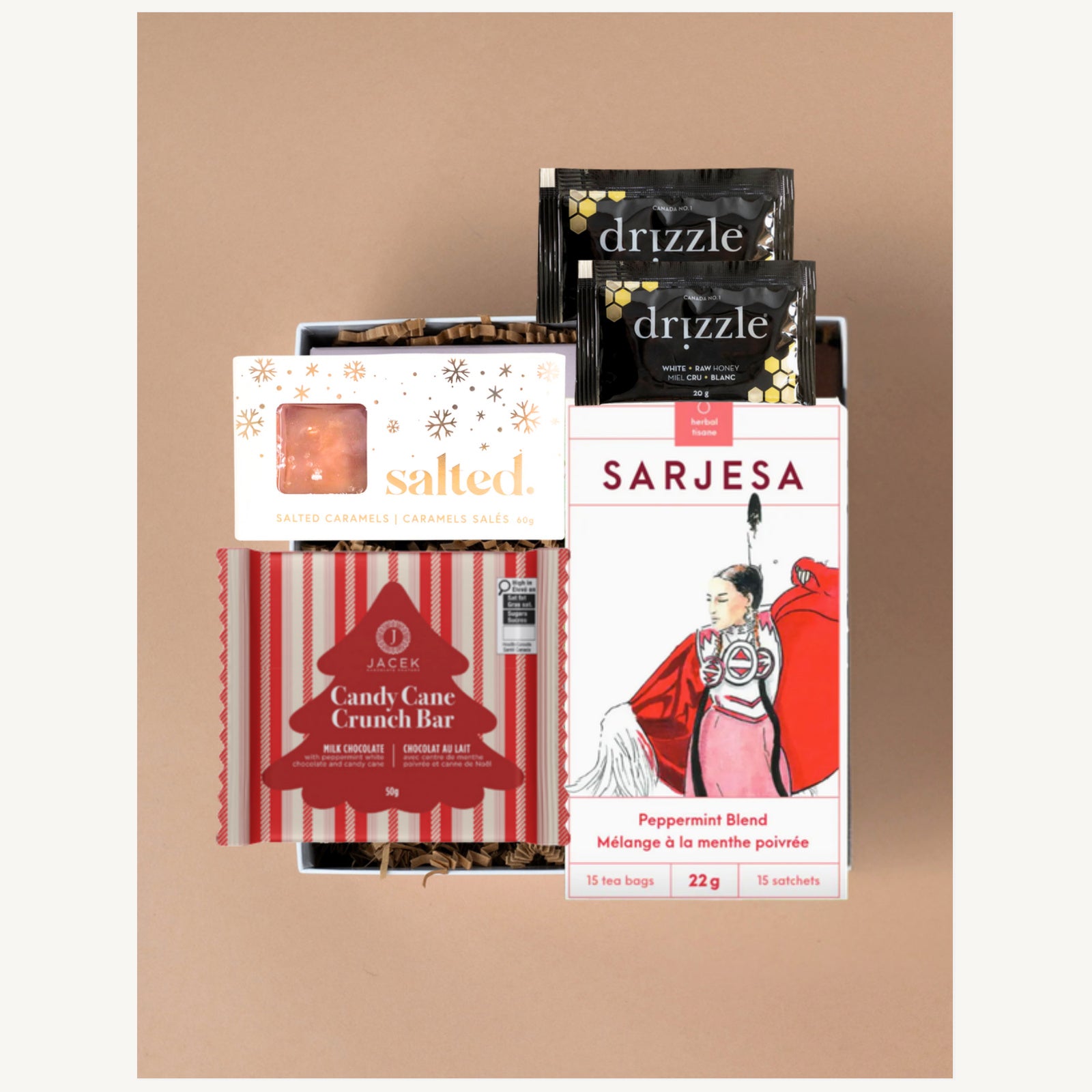 The Albertan gift selection with Sarjesa peppermint tea, Drizzle honey, JACEK Candy Cane Crunch chocolate and Salted caramels.