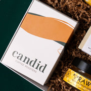 Candid coffee beside Beaver Creek raw honey in The New Home gift.