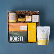 The Park gift box with Roasti coffee, Beaver Creek honey, JACEK chocolate, an Em & Oak candle, Oak & Aspen soap and a shower steamer.