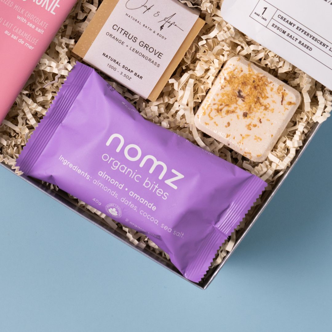 Nomz almond organic date bites in The Zen self-care gift box.